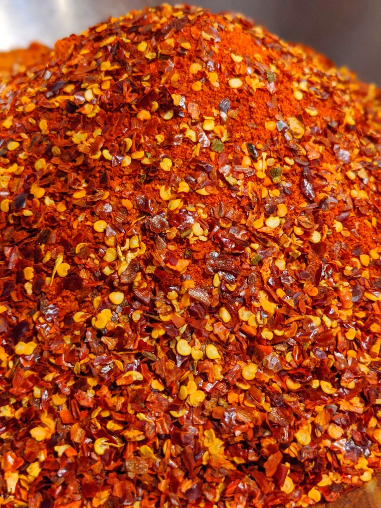 Rivera's spicy sazón uses red chili pepper flakes for an extra kick.