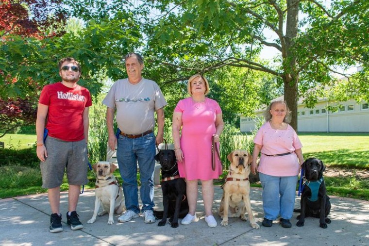 Joanne Callahan joins other graduates of Guiding Eyes for the Blind as they partner with their guide dogs