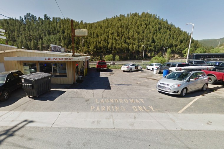 Idaho Springs, Colorado, police followed a vehicle they said rolled through a stop sign into a laundromat's parking lot in September 2019.