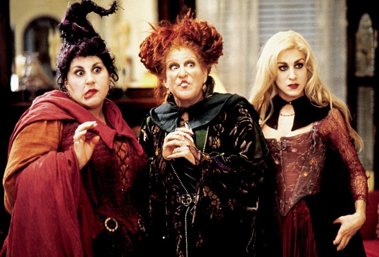Kathy Najimy, Bette Midler and Sarah Jessica Parker as the Sanderson sisters in the movie "Hocus Pocus" which airs in October on Freeform. 
