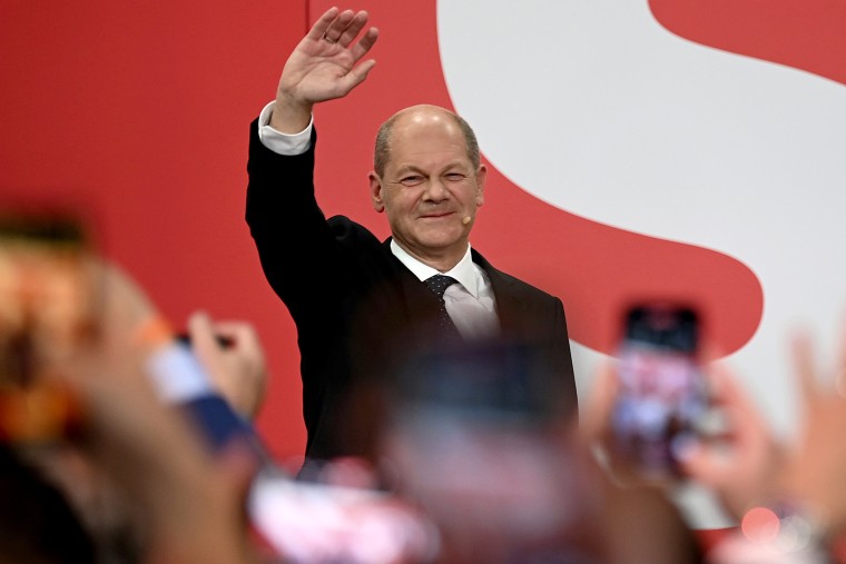Olaf Scholz, leader of Germany's SPD party, waves during the election at Willy Brandt House in Berli on Sept. 26, 2021.
