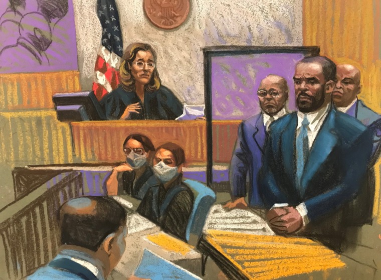 R. Kelly stands as the jury foreman reads the guilty verdict in Kelly's sex abuse trial at Brooklyn's Federal District Court in New York on Sept. 27, 2021.