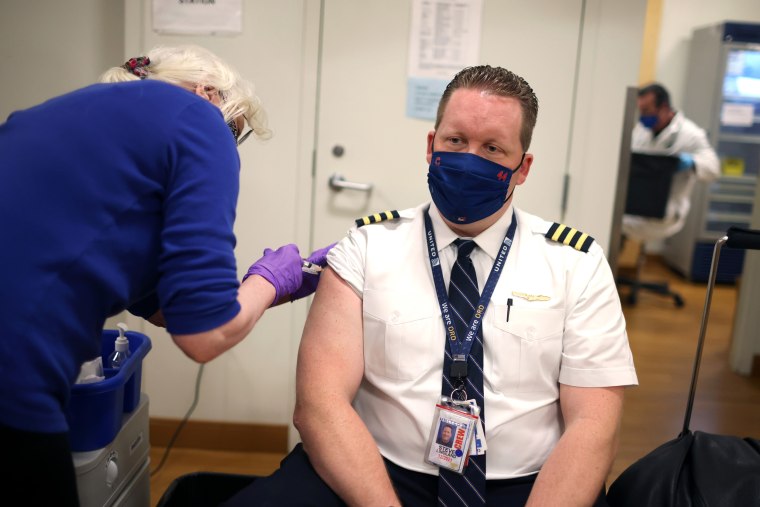 United Airlines Employees Receive COVID-19 Vaccination At O'Hare Airport