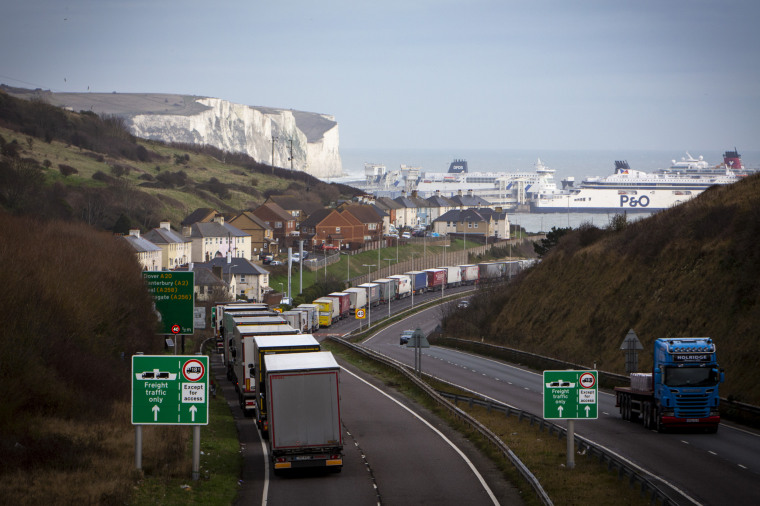 Image: Freight trucks line up on the M20 motorway near Dover port in December 2020