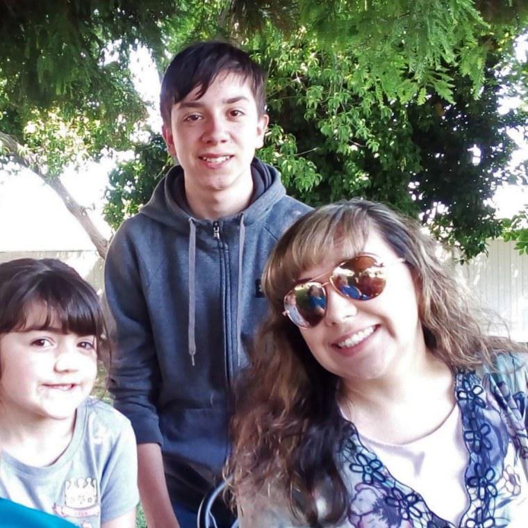 Joanna Flores with her children Sarah, 8, and Matthew, 16.