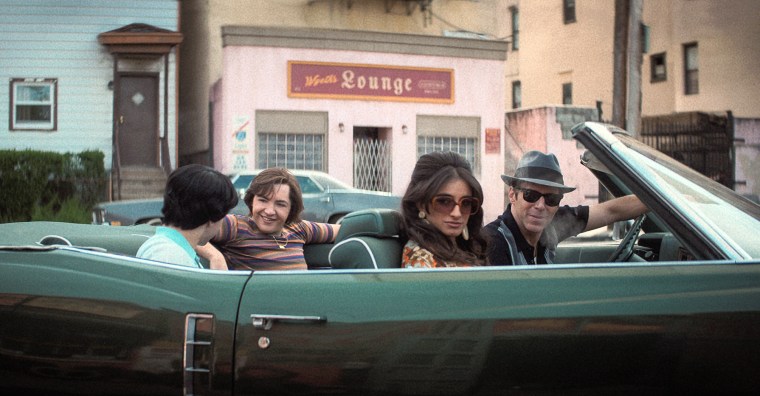 Michael Gandolfini as Teenage Tony Soprano, Michela De Rossi as Giuseppina Moltisanti and Lessandro Nivola as Dickie Moltisanti in "The Many Saints of Newark."