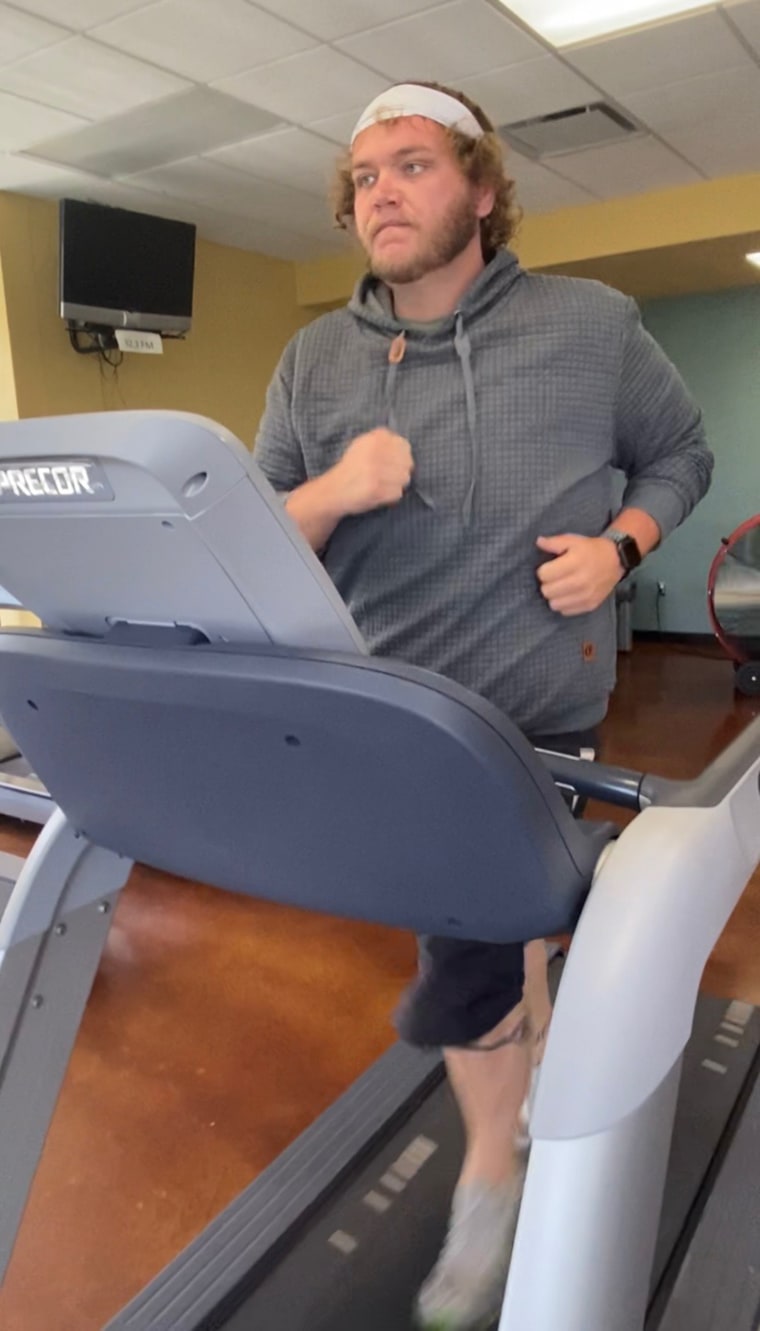 Much of Jarred Aslett's exercise happened in his makeshift home gym, where he cobbled together exercise equipment to help him lose weight. Giving his dog extra walks also helped him. 