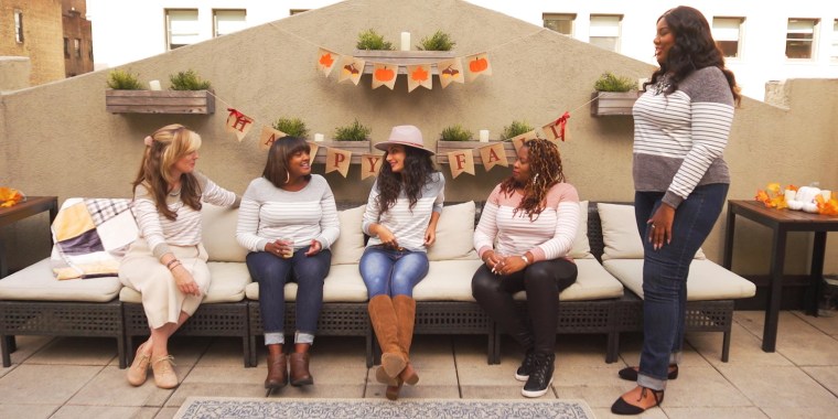 Five Woman with different sizes bodies sitting outside wearing the Vemvan's Long-Sleeve Color Block Striped T-Shirt