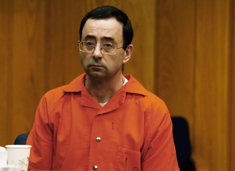 Former Michigan State University and USA Gymnastics doctor Larry Nassar listens during the sentencing phase in Eaton, County Circuit Court on Jan. 31, 2018 in Charlotte, Mich.