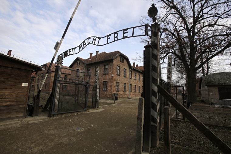 German writing "Work Sets You Free" on the gate of the Auschwitz Nazi death camp in Oswiecim, Poland.