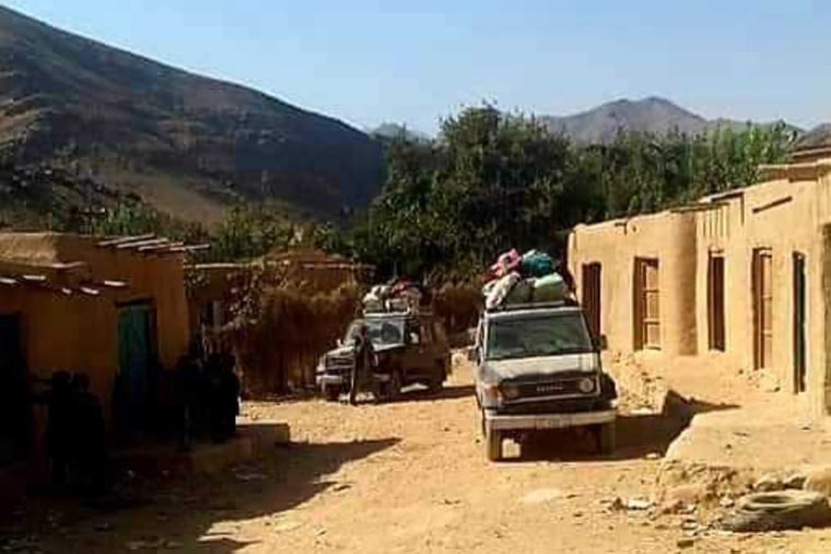 A photo taken by Mohammad purportedly shows Hazara families in Afghanistan's Daykundi province leaving their homes after the Taliban ordered them to evacuate their houses this month.