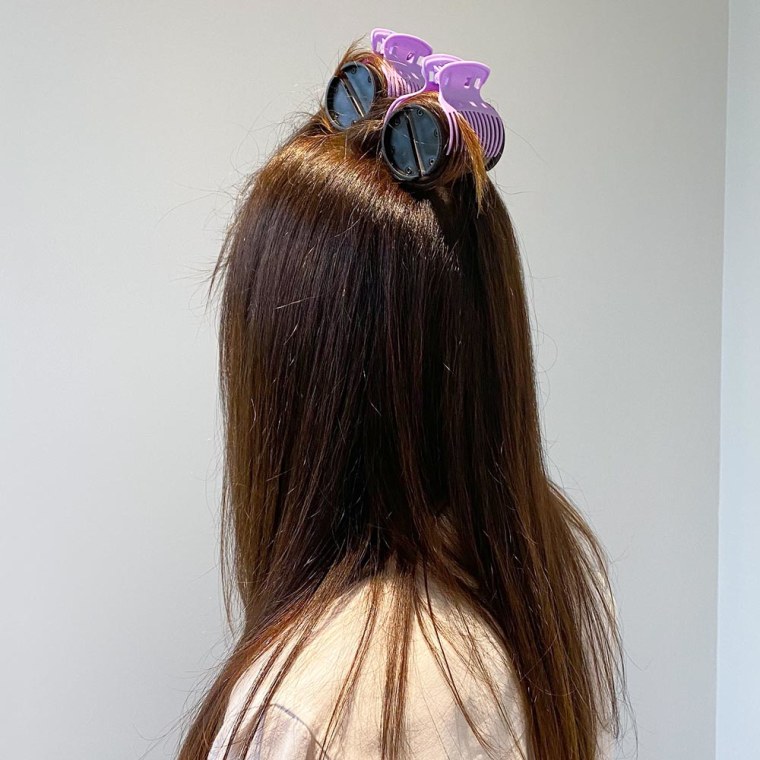 Writer Molly Fahner Calhoun using Conair hot hair curlers in her hair