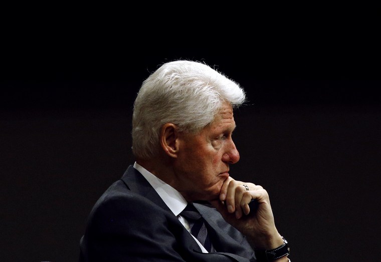Image: Former President Bill Clinton listens at a panel in Baltimore in 2017.