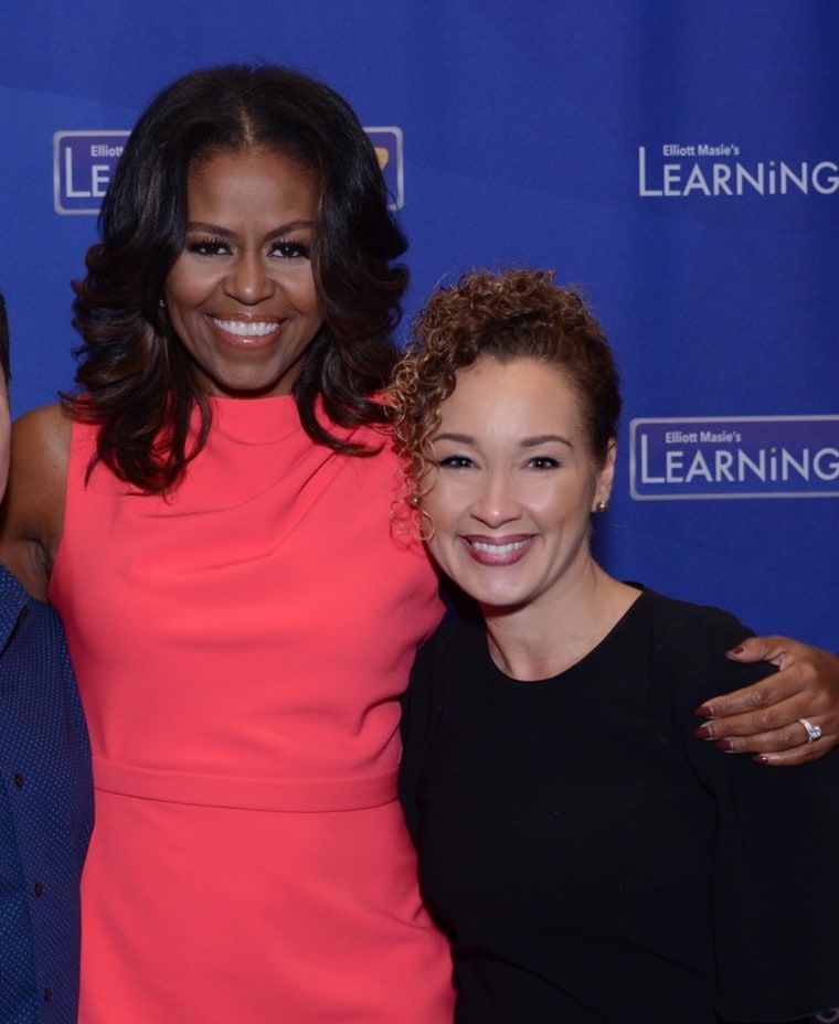 Nancy Santiago with former First Lady Michelle Obama.