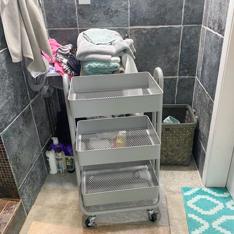 Image of writer Terri Peter's bathroom, after using a storage cart to organize