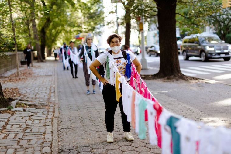 PUSH for Empowered Pregnancy strung 900 onesies throughout the streets of New York City to represent the 900 babies born still in the city every year. The organization is "doing everything in (their) power to make sure other families" don't experience stillbirths. 