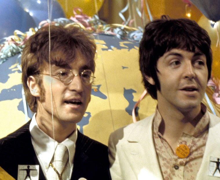 Paul McCartney and John Lennon at a press call for Our World broadcast.