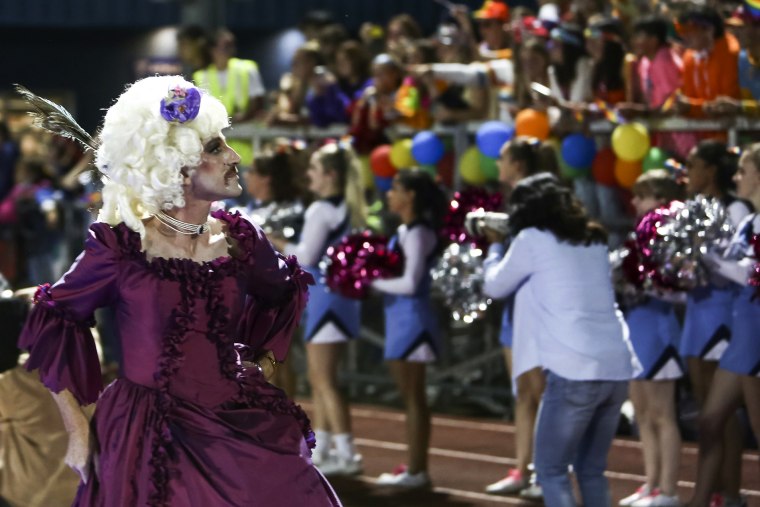 People participate in the "drag ball" halftime show at Burlington High School on Oct. 15, 2021, in Burlington, Vt.