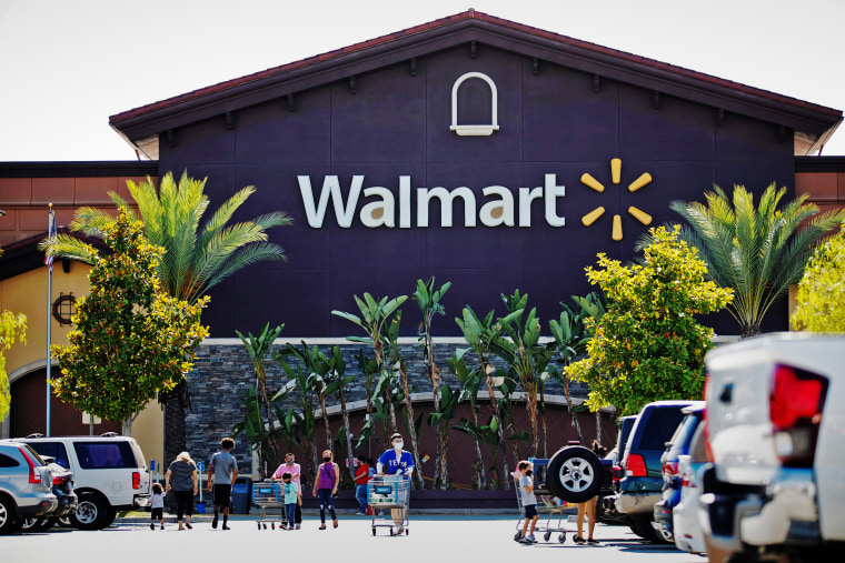Shoppers in the parking of a Walmart Superstore in Rosemead, Calif.