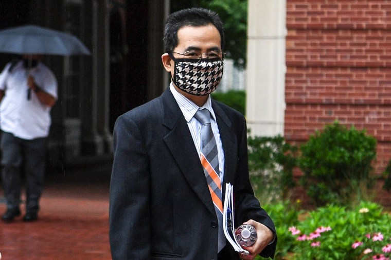 Anming Hu enters the Howard H. Baker Jr. United States Courthouse in downtown Knoxville, Tenn., on June 7, 2021.