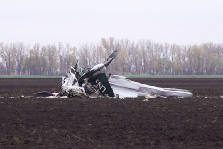 Image: The scene of a plane crash in a field near Buxton, N.D.