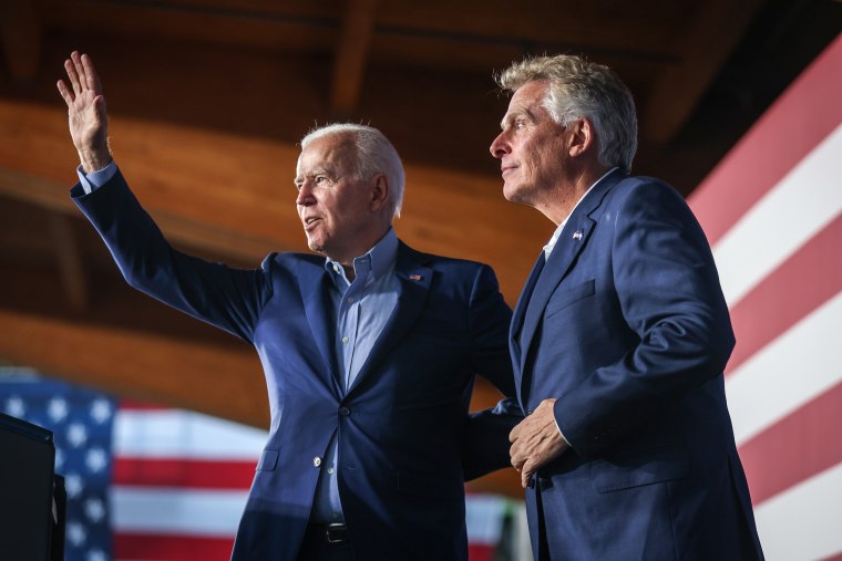 President Joe Biden, left, stands with Terry McAuliffe, Democratic gubernatorial candidate for Virginia, during a campaign event in Arlington, Va., on July 23, 2021.