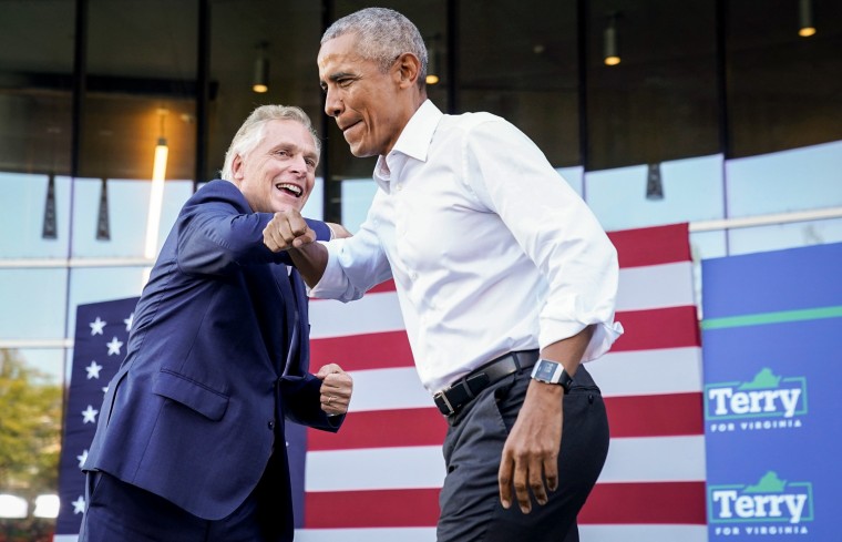 Image: Virginia Democratic gubernatorial candidate Terry McAuliffe welcomes former President Barack Obama during his campaign rally in Richmond, Va., on Oct. 23, 2021.