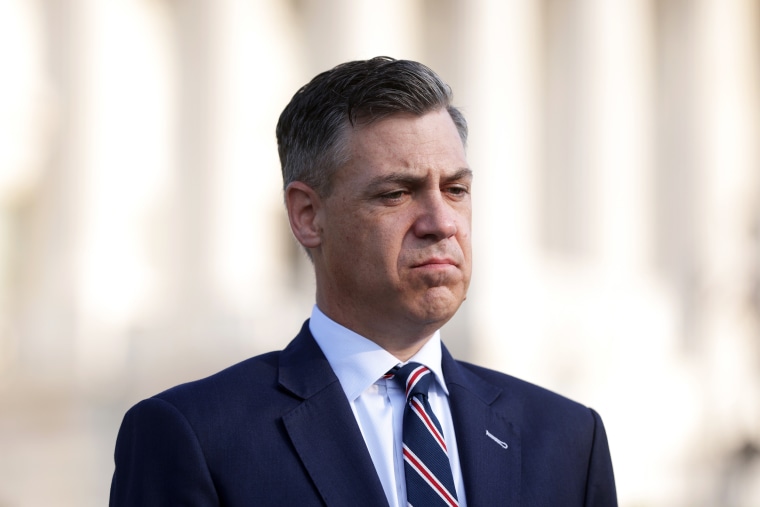 Rep. Jim Banks, R-Ind., listens during a news conference in front of the Capitol on July 27, 2021.