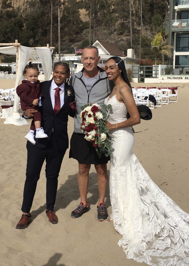 The brides said meeting Hanks was the "cherry on top" of their wedding day.