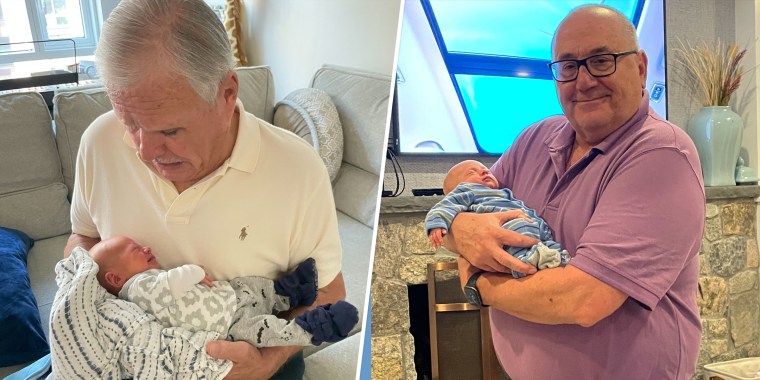 Baby Rusty in the arms of his grandfathers — Dylan's dad, James, on the left and her father-in-law, Russell, on the right.
