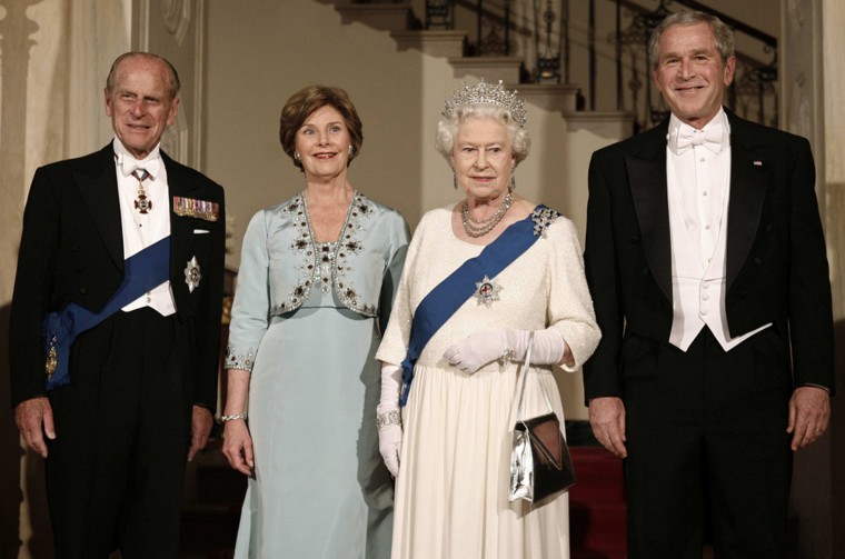 U.S. President George W. Bush, First Lady Laura Bush, Britain's Queen Elizabeth II and Prince Philip, the Duke of Edinburgh pose for a picture at the Grand Foyer of the White House for a State Dinner in Washington