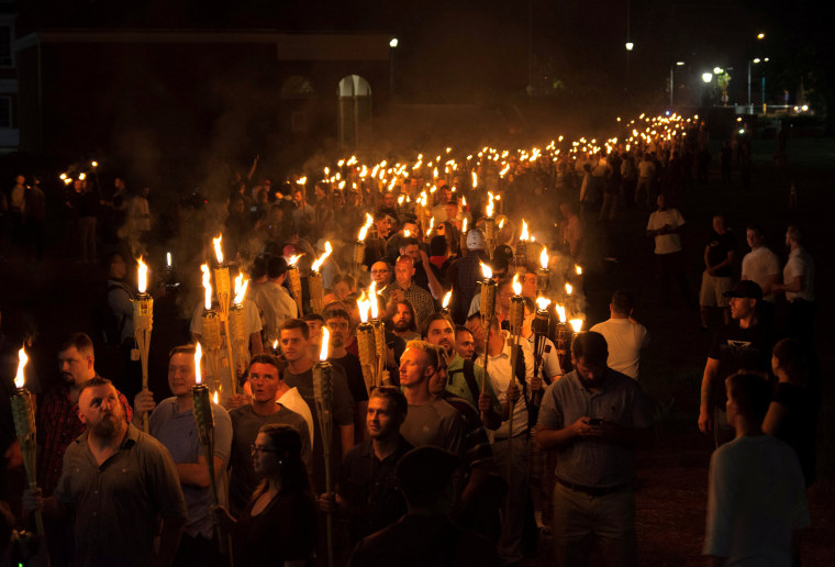 Image: White nationalists carry torches on the grounds of the University of Virginia