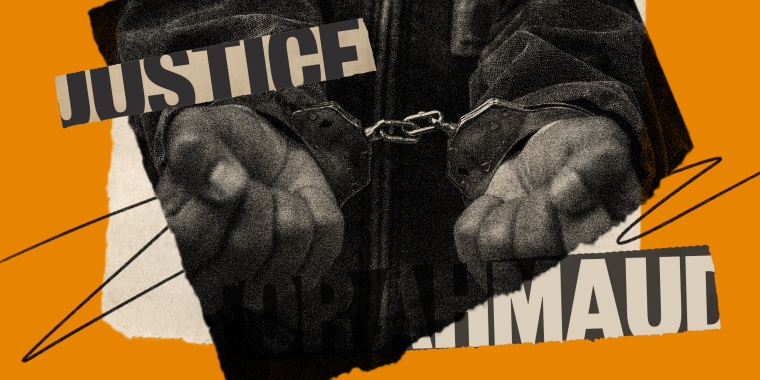 Photo illustration: Image of hands in handcuffs, two pieces of paper partially read the words,\"Justice\" and \"Ahmaud\".