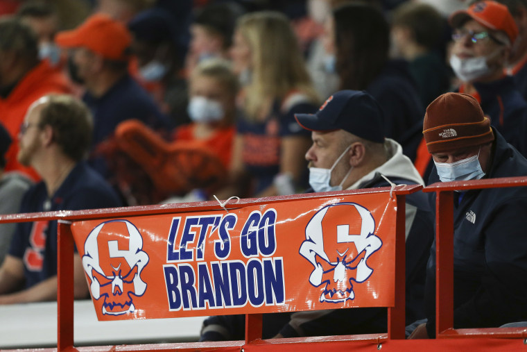 "Let's Go Brandon," seen here on a sign at a college football game, is used as shorthand to insult President Biden.