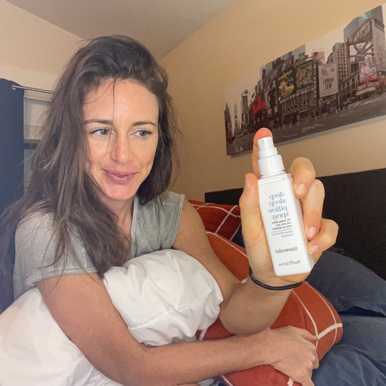 Image of writer Katie Jackson using her Deep Pillow Spray to help her sleep
