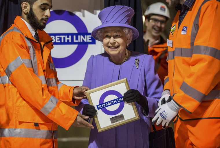 Image: Britain's Queen Elizabeth attends the formal unveiling of the new logo for Crossrail, which is to be named the Elizabeth line, at the construction site of the Bond Street station in central London