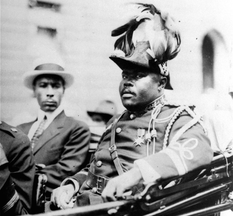 In this August 1922 file photo, Marcus Garvey is shown in a military uniform as the "Provisional President of Africa" during a parade on the opening day of the annual Convention of the Negro Peoples of the World along Lenox Avenue in Harlem borough of New York.