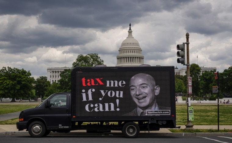 Image: Mobile Billboard Moves Around DC In Tax Day Protest