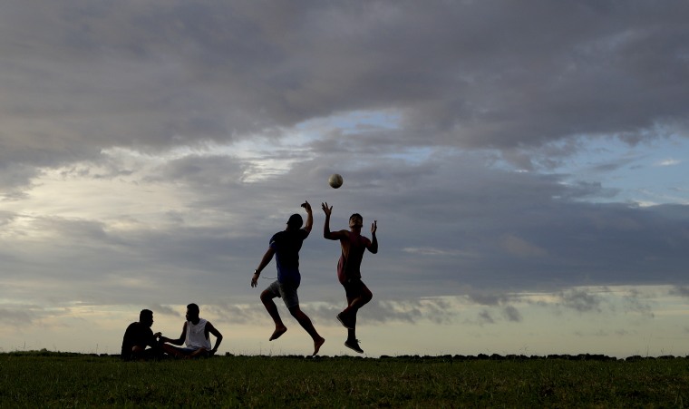 Playing rugby at sunset in Nuku'alofa, Tonga, in 2019. The South Pacific island nation reported its first coronavirus case of the pandemic last week.