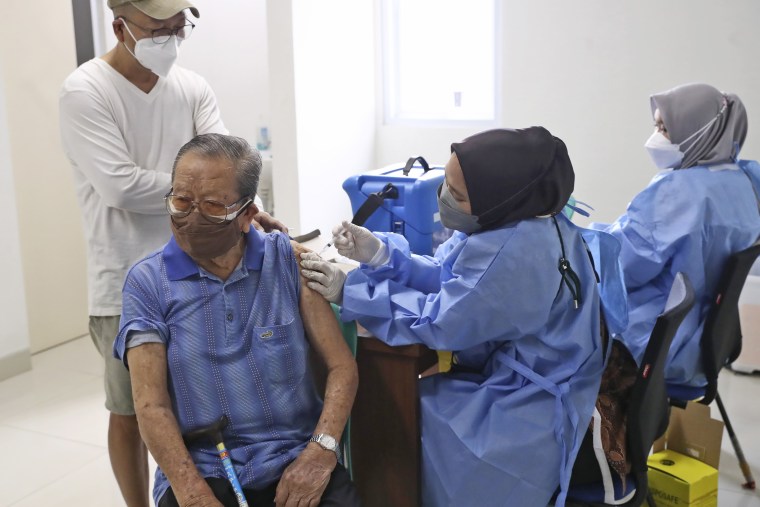 A Covid-19 vaccine being administered at a community health center outside Jakarta, Indonesia, on Oct. 28, 2021.