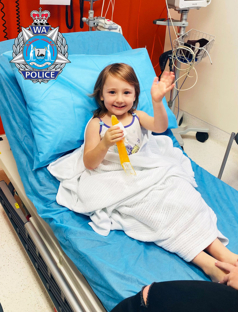 Image: Cleo Smith waves from a hospital after being found.