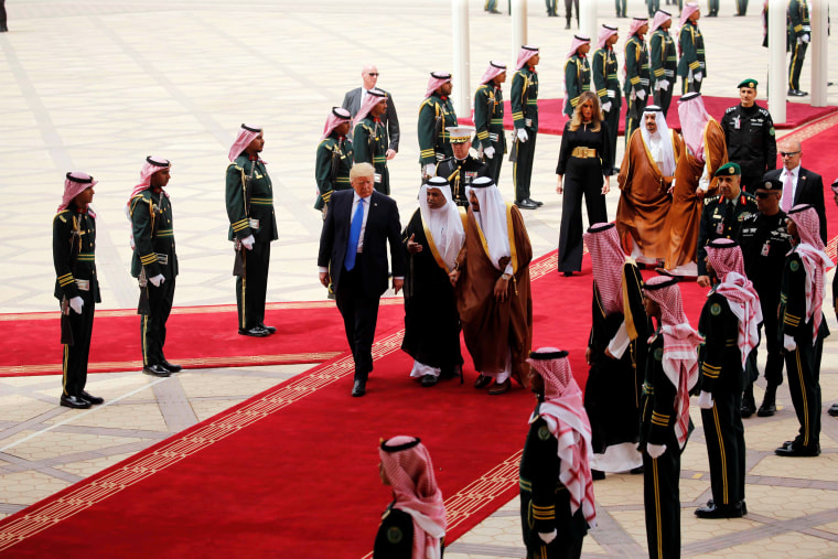 Saudi Arabia's King Salman bin Abdulaziz Al Saud welcomes President Donald Trump during a reception ceremony in Riyadh on May 20, 2017.