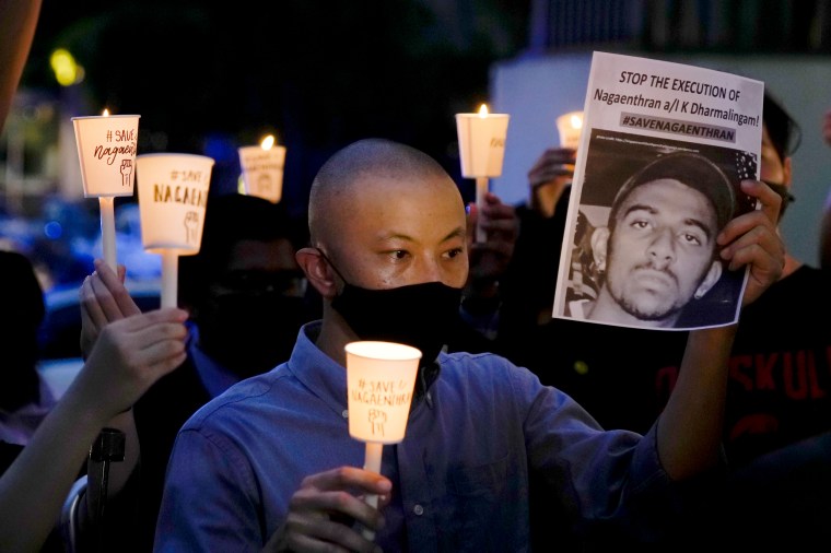 Activists attend a candlelight vigil against the impending execution of Nagaenthran K. Dharmalingam in Kuala Lumpur, Malaysia, on Nov. 8, 2021.