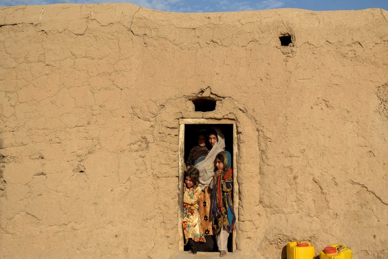 Image: An Afghan family at their home in Haji Rashid on Oct. 15, 2021.