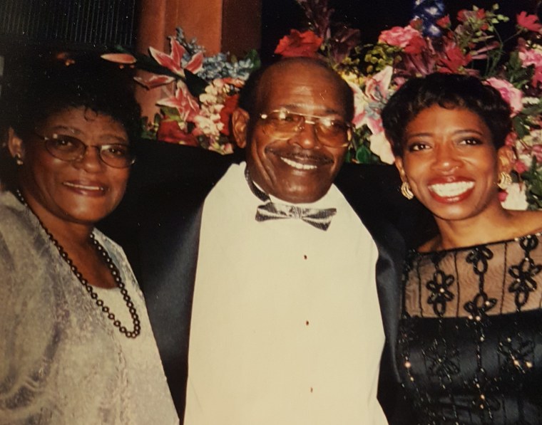 Carla Harris with her mom and dad.
