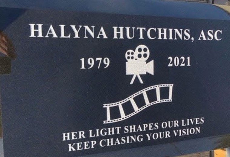 Halyna Hutchins' gravestone included an image of a camera and film. 