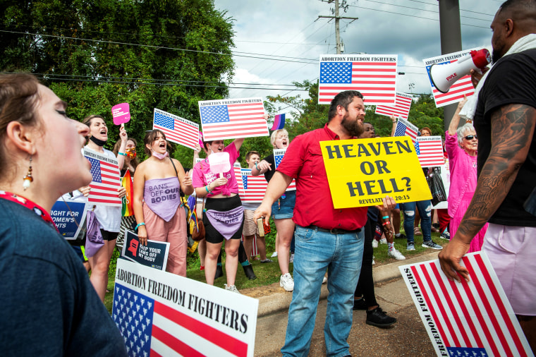 Abortion rights and anti-abortion activists argue at the Abortion Freedom Fighters Rally in Jackson, Miss., on Oct. 2, 2021.