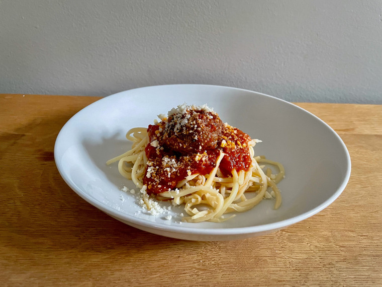 Trader Joe's Hearts of Palm Pasta topped with marinara sauce and Parmesan cheese.