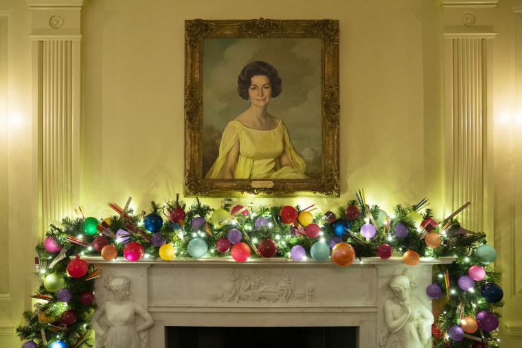 A portrait of first lady Claudia "Lady Bird" Johnson hangs in the Vermeil Room of the White House during a press preview of the White House holiday decorations, Monday, Nov. 29, 2021, in Washington.