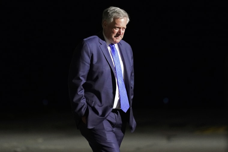 White House chief of staff Mark Meadows walks as President Donald Trump speaks at a campaign rally in Duluth, Minn., on Sept. 30, 2020.